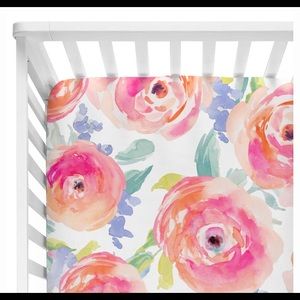 Girls fitted crib sheet.